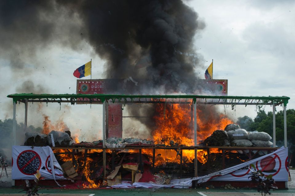 A pile of seized drugs burn after being set on fire during a ceremony to mark the UN's "International Day against Drug Abuse and Illicit Trafficking" in Yangon on June 26, 2016. Myanmar authorities on June 26 destroyed seized narcotics worth 56.31 million USD in anti-drug ceremonies in Yangon, Cambodia