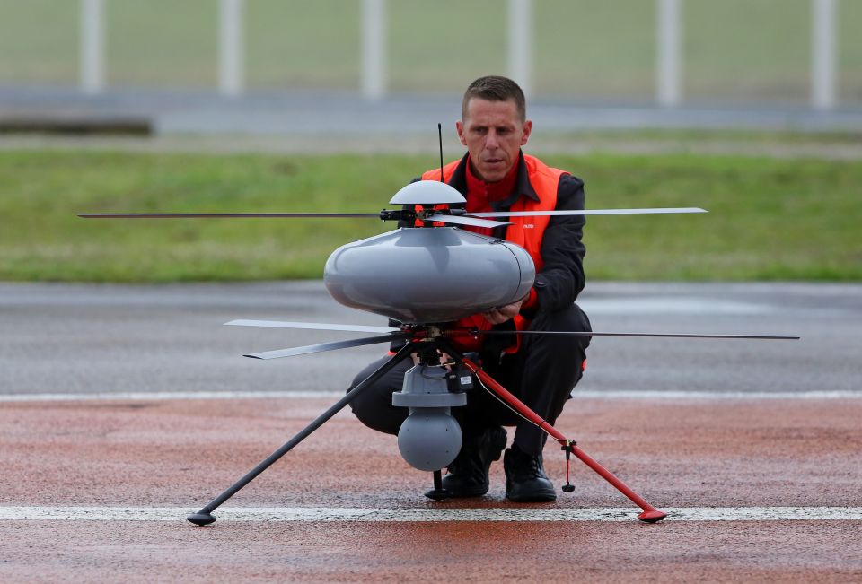 A pilot prepares a new security drone at Eurotunnel in Calais