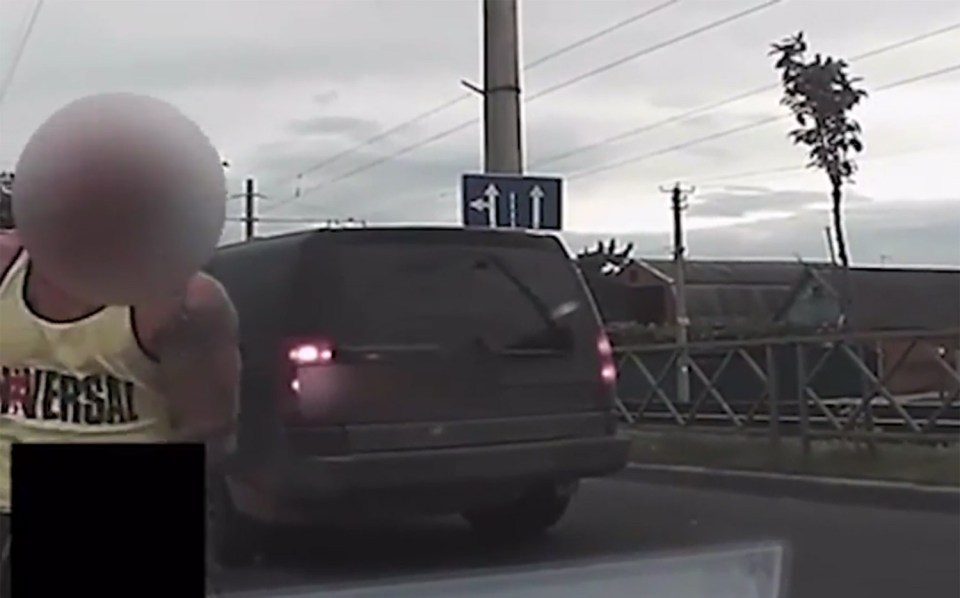In a bizarre twist, he then flashes his penis at the appalled driver