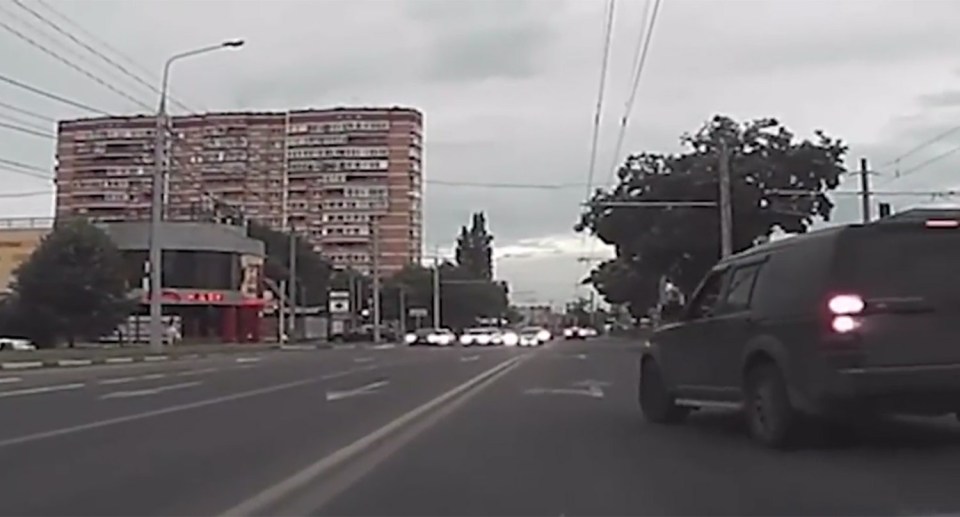 He cuts across two lanes of traffic to block the learner driver