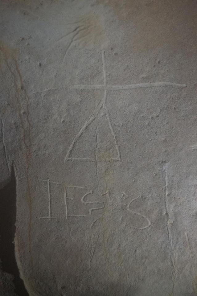 Indigenous people began carving Christian icons into the wall following their conversion