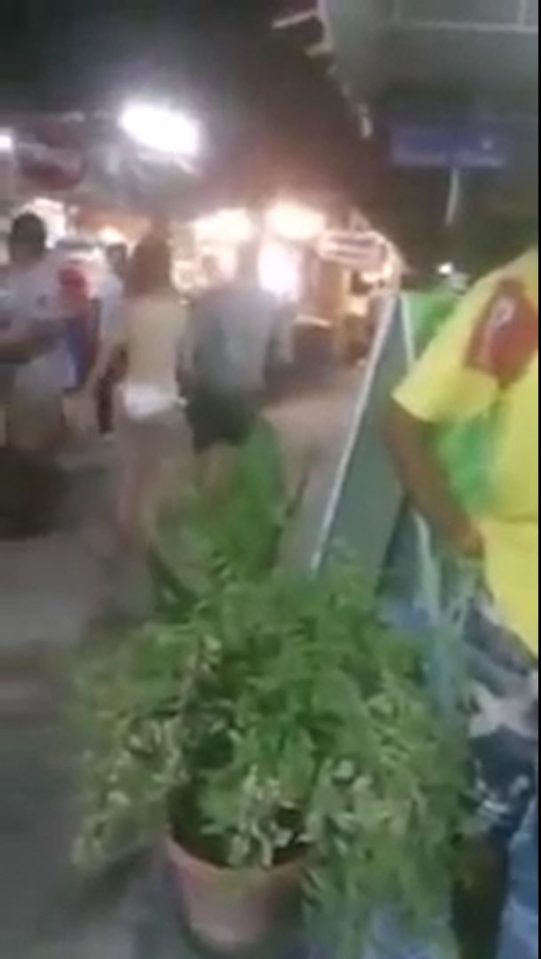 American Woman Gives Boyfriend Public Oral in Front of a Hotel.mp4.00_01_32_20.Still018