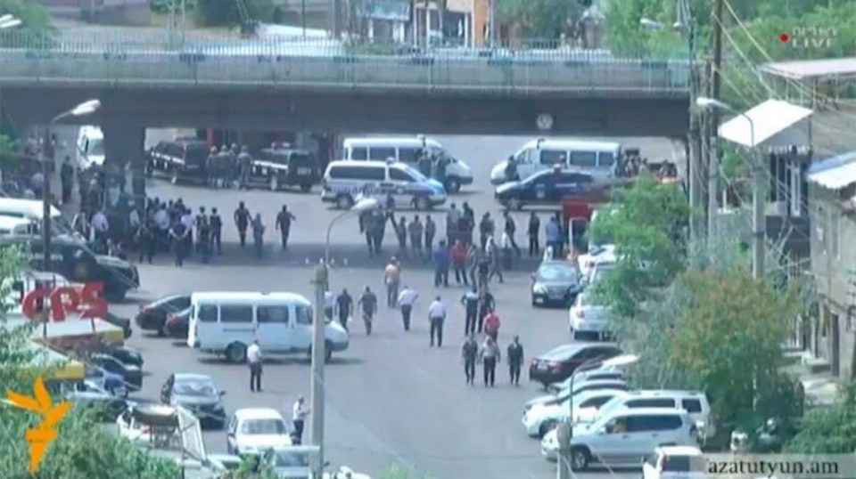 People begin to line the streets after reports of an attempted coup