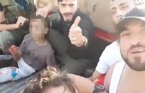 US-backed Syrian rebels film themselves beheading 11-year-old boy for being a spy
