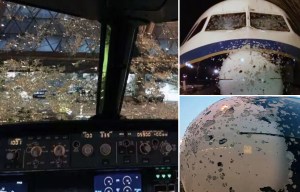 Hero pilot lands holiday jet 'blind' after massive storm cracks its battered windscreen