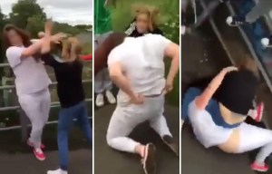 Shocking moment jeering mob of men encourage two teen girls to fight each other