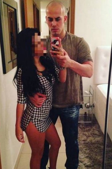 Marcio Garcia de Andrade with one of the 16-year-old girls held as a prostitute