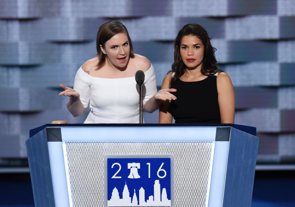 Actresses America Fererra (R) and Lena Dunham (L) arrive onm stage to address the second day of the Democratic National Convention at the Wells Fargo Center, July 26, 2016 in Philadelphia, Pennsylvania. / AFP PHOTO / SAUL LOEBSAUL LOEB/AFP/Getty Images