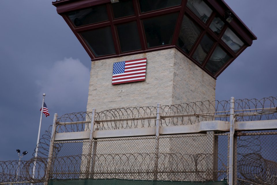 The United States flag decorates the side of a guard tower inside of Joint Task Force Guantanamo Camp VI at the U.S. Naval Base in Guantanamo Bay