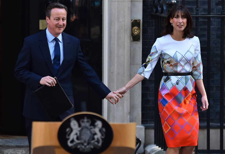 British Prime Minister David Cameron (L)