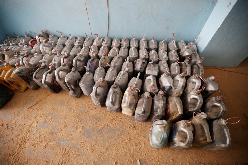 Booby-trapped buildings, including schools, were left littered with explosives, which were rigged to blow as soon as someone entered 