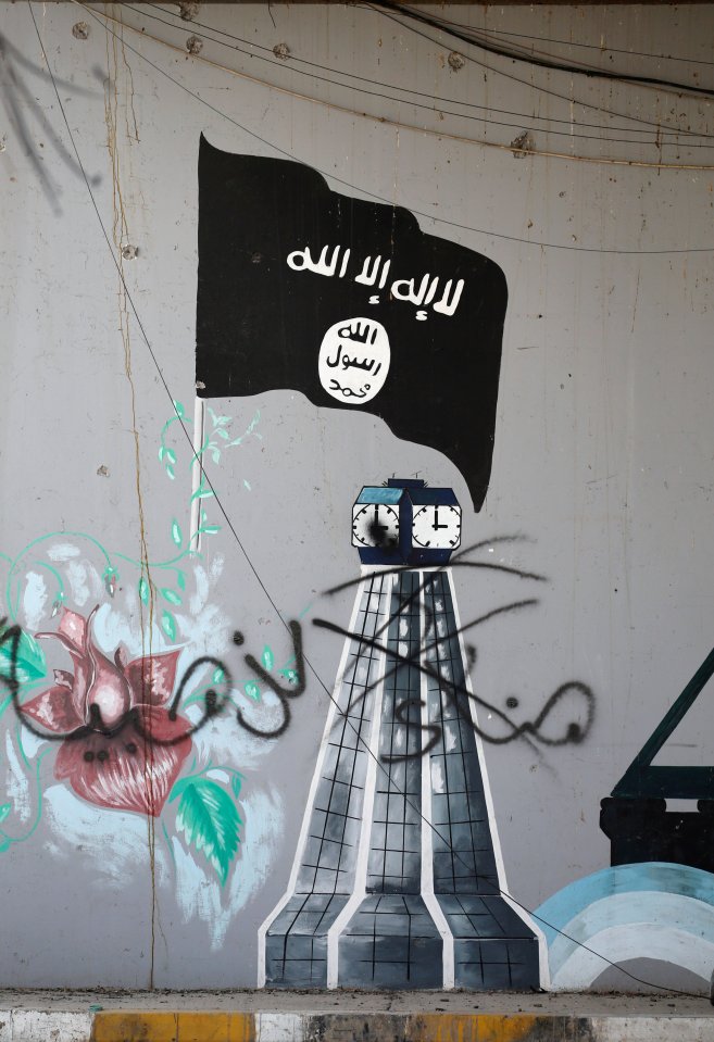 Most ISIS paintings have already been covered up by victorious Iraqi fighters, although some sick ISIS flags remain in the city