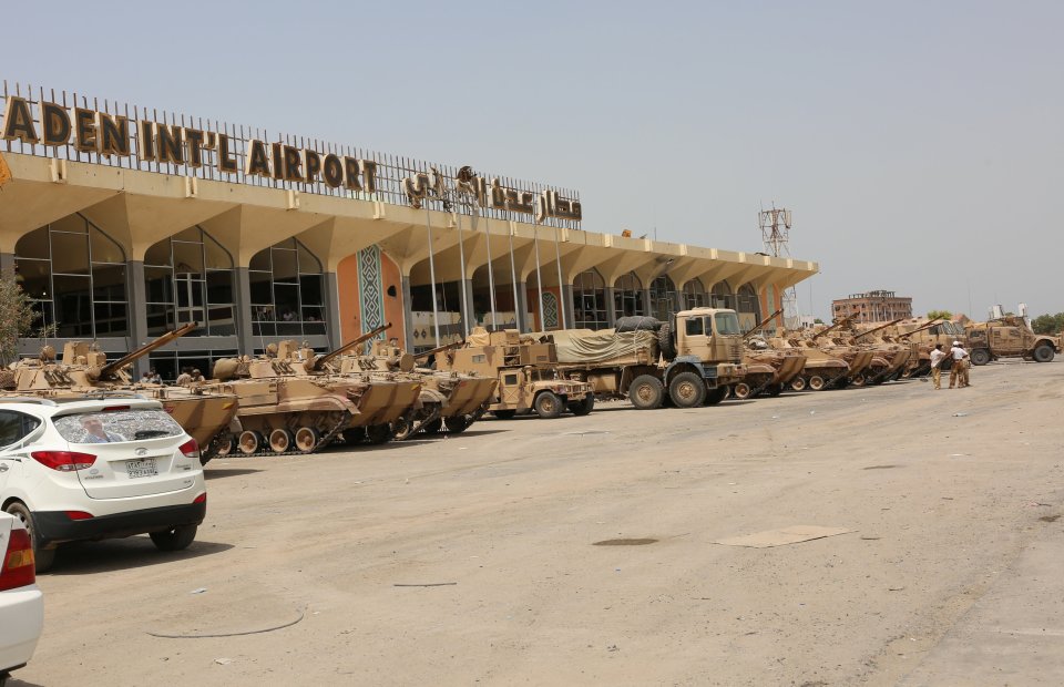 UAE military vehicles are seen at the international airport of the southern port city of Aden