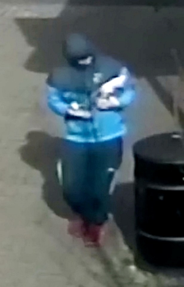 Once the petrol bomb is lit, he steps away from the bin and walks towards the halal butchers shop