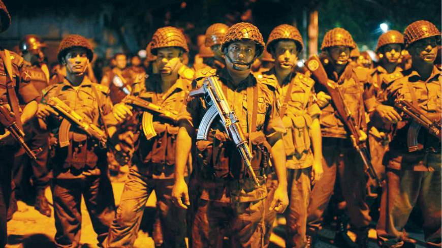 Soldiers stand guard at the restaurant, located in the city's diplomatic quarter
