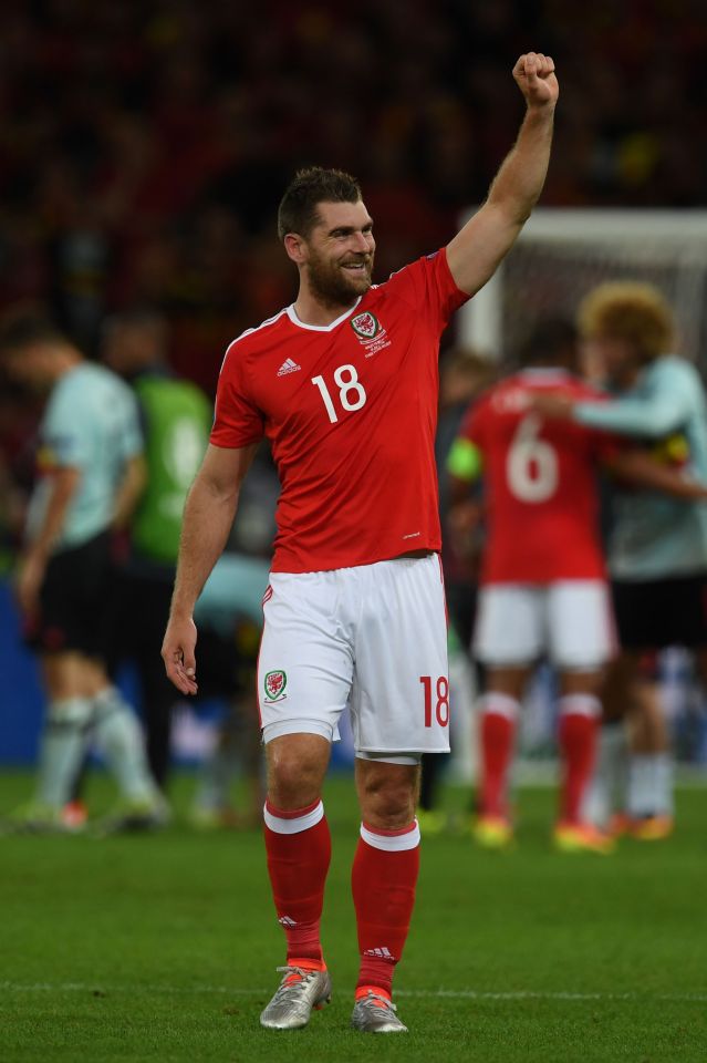 Wales' forward Sam Vokes gestures after