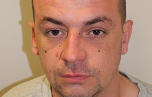 Vicious thug knifed his ex-girlfriend while she slept and only stopped when her son jumped on his back