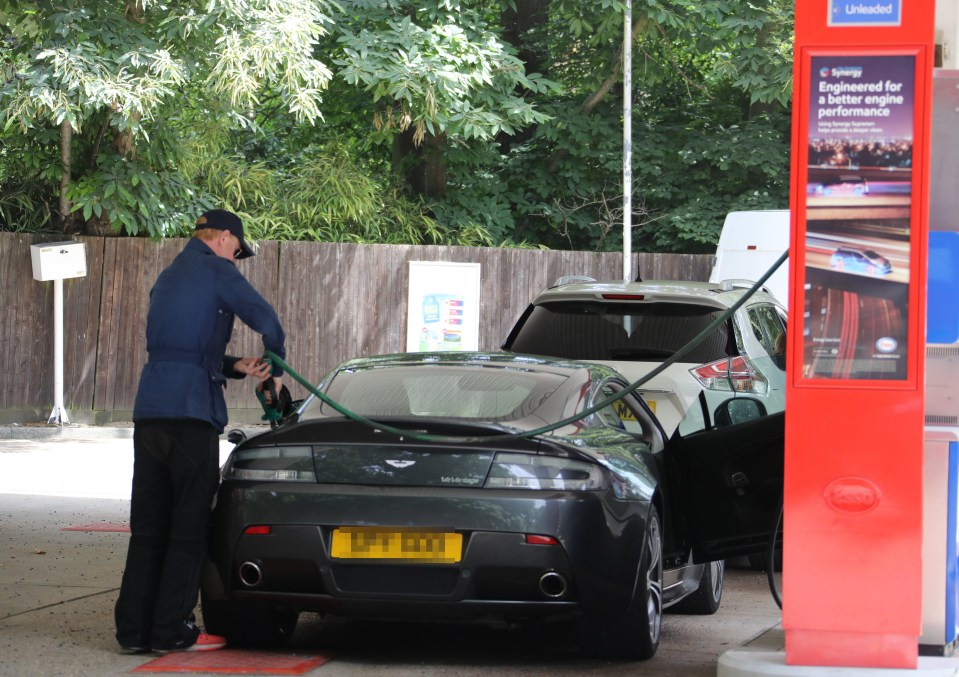 The BBC star was spotted pumping his own gas in London this afternoon