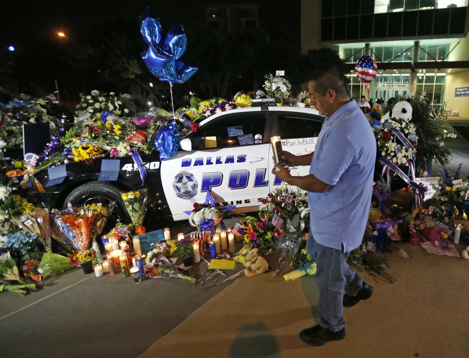 In Dallas vigils broke out as the city came to terms with the murderous shootings 