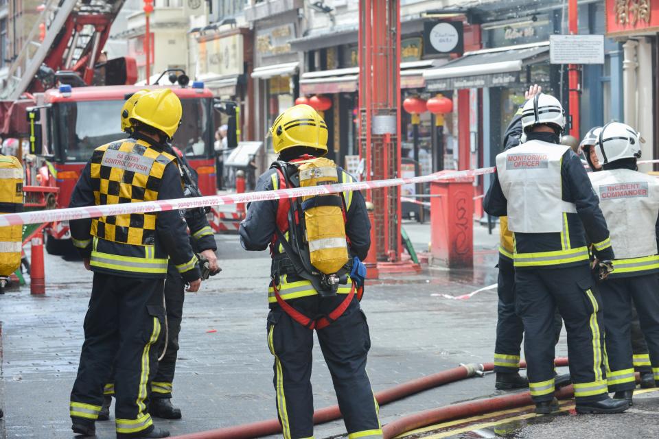 Gerrard Street, London, UK. 10th July 2016. Fire engines attend to a fire above restaurants on Gerrard Street in Chinatown ¿ Matthew Chattle/Alamy Live News