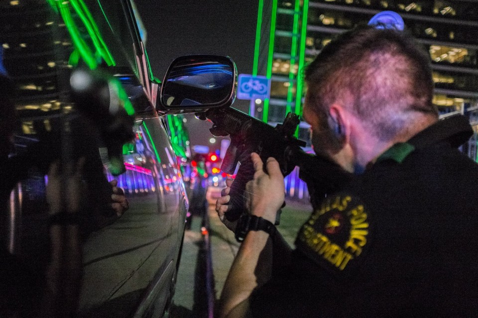Mr Smith spent hours protecting a photographer caught in the middle of the firefight 