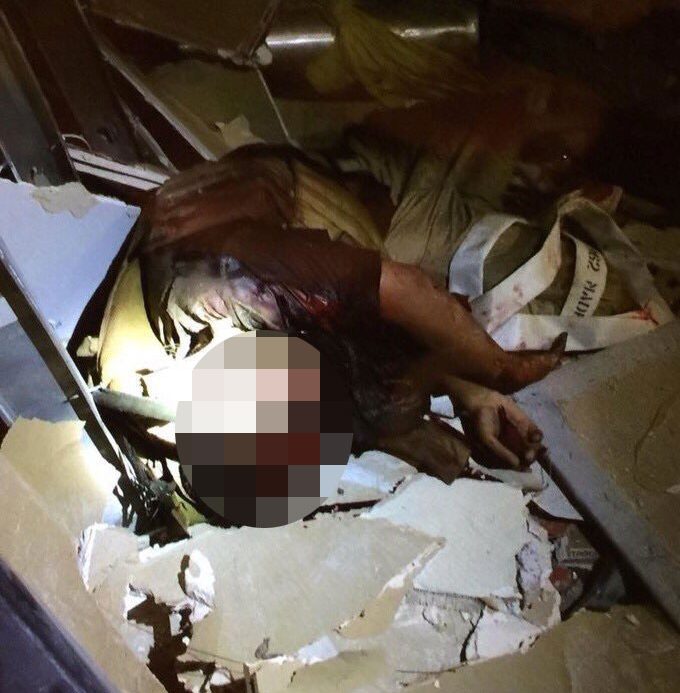 An unverified photograph of Micah Johnson after police sent in a robot with an explosive into his hideout when negotiations broke down
