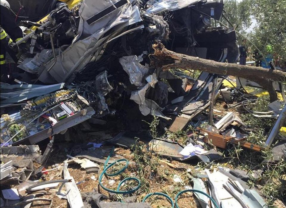 Train carriages crumpled like accordians in the impact of the head-on smash
