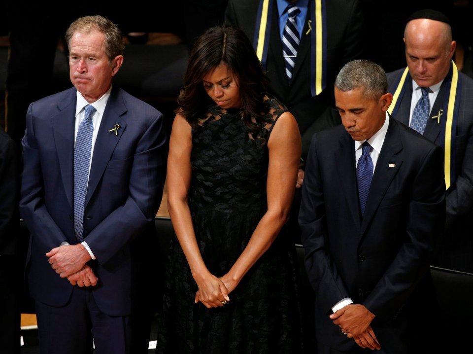 US President Barack Obama pauses while speaking at cop memorial in Dallas