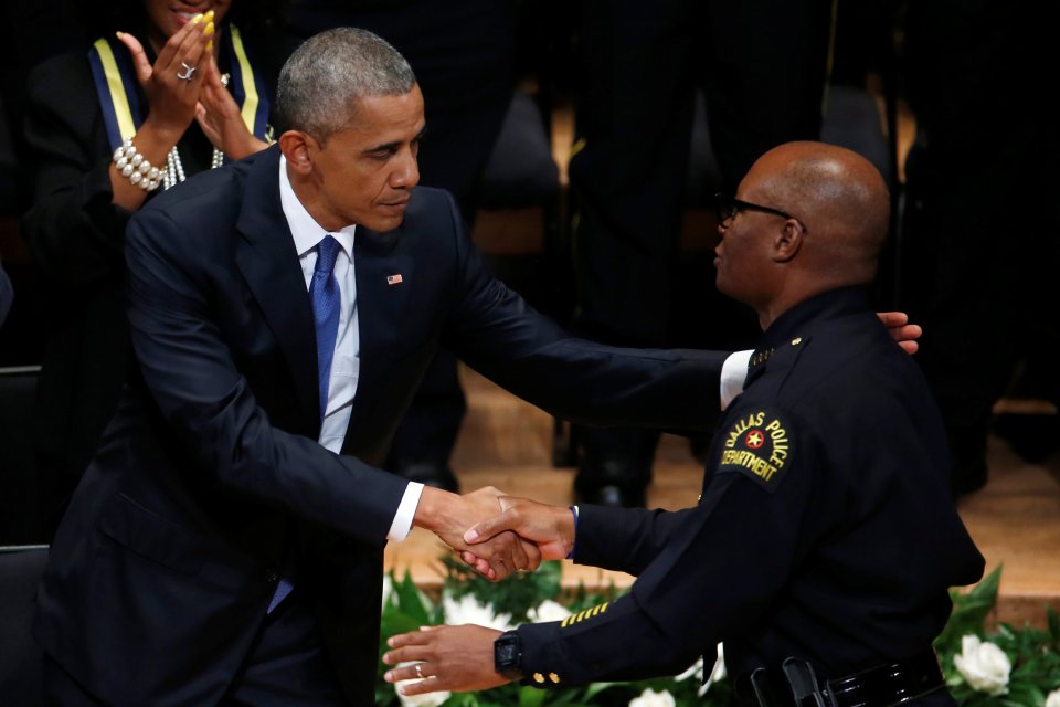 US President Barack Obama pauses while speaking at cop memorial in Dallas
