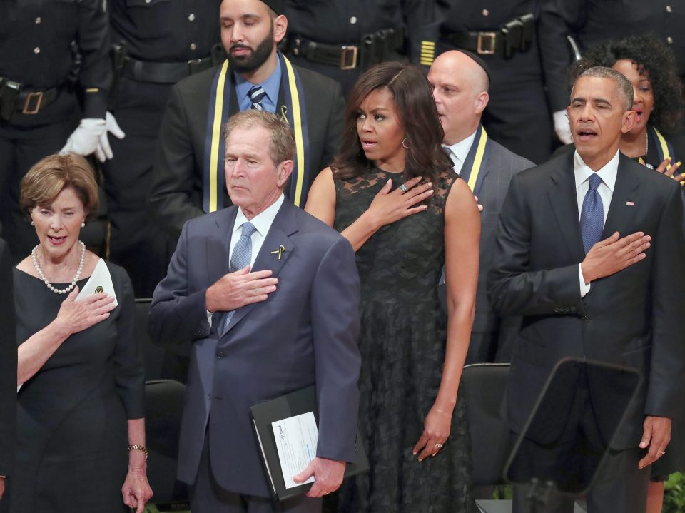 US President Barack Obama pauses while speaking at cop memorial in Dallas