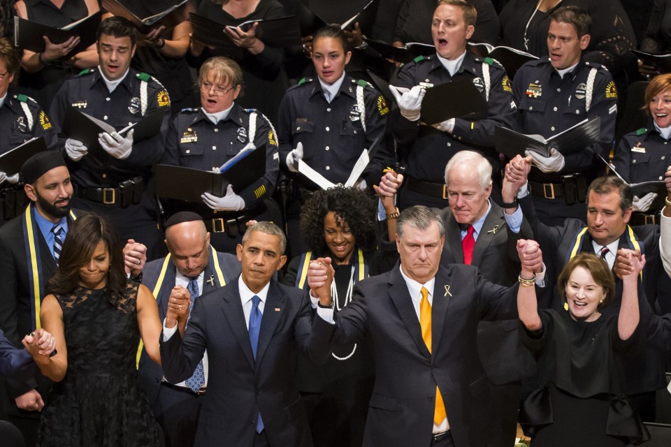 US President Barack Obama pauses while speaking at cop memorial in Dallas