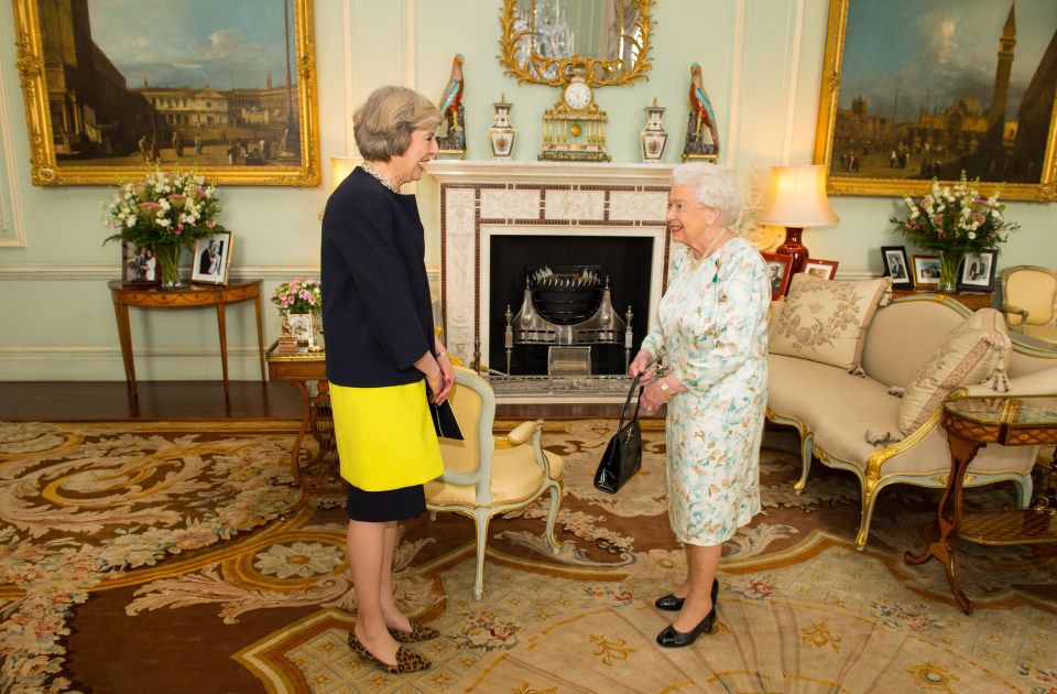 The new PM wore a striking black and yellow outfit with signature kitten heels