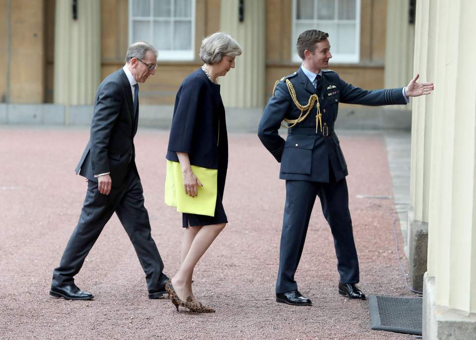 Mrs May's husband Philip had accompanied her to Buckingham Palace