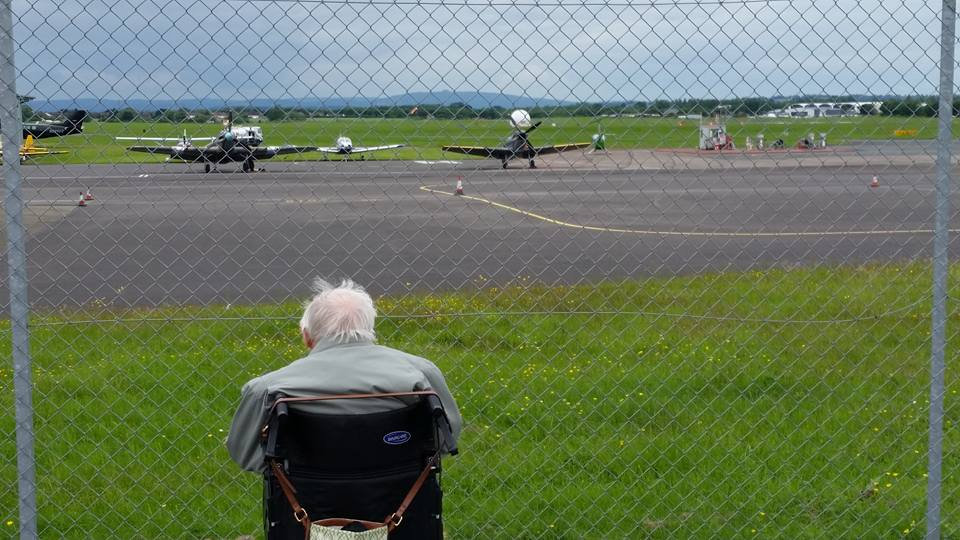 Ken Farlow looks on at the iconic Spitfires he helped to maintain during the Second World War