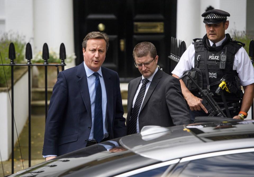 David Cameron leaves his new London home.