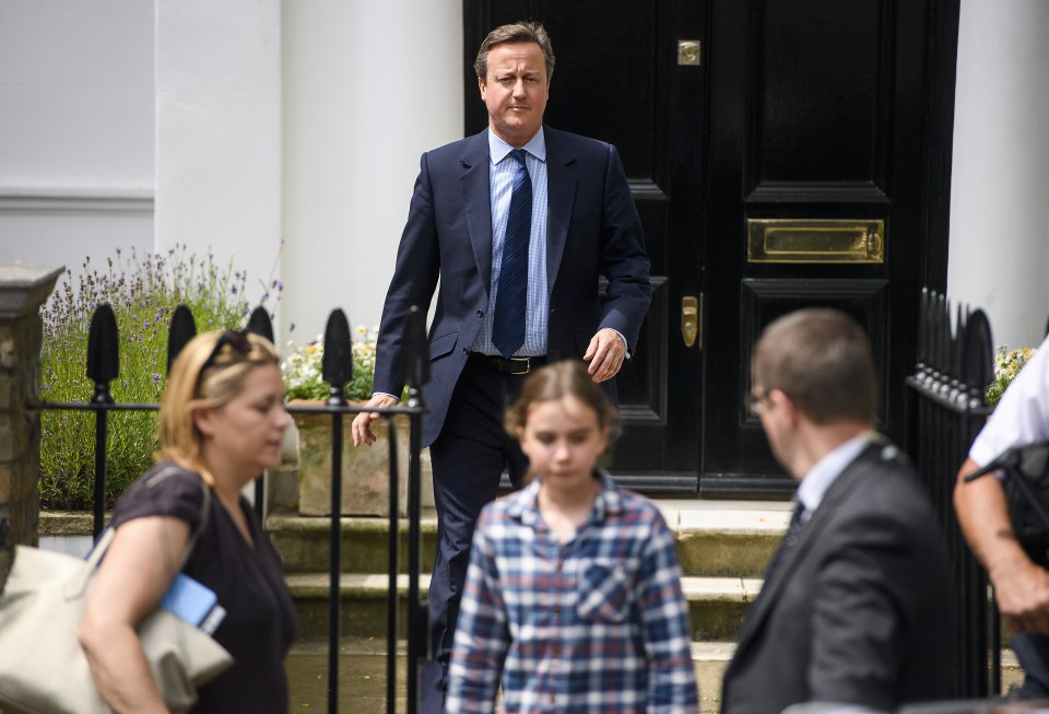David Cameron leaves his new London home.