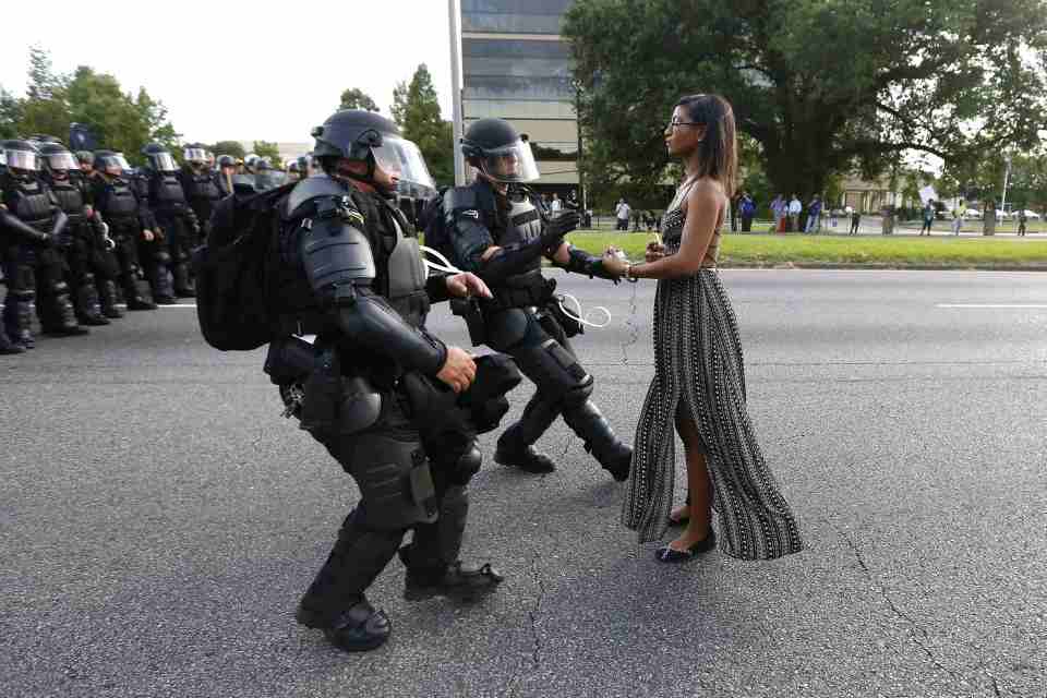 Protestor Ieshia Evans is detained by law enforcement near the headquarters of the Baton Rouge Police Department in Baton Rouge