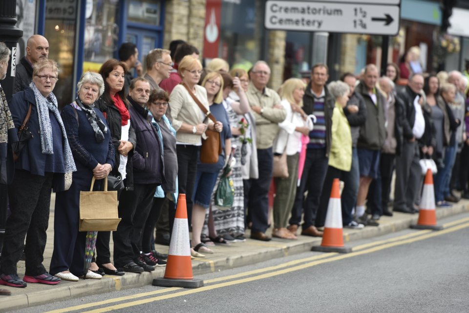 More people, wanting to be involved in the day, stand on the pavement of a town where there MP was brutally murdered 