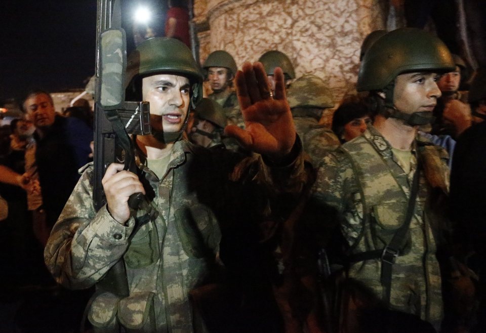The coup soldiers swarmed onto the streets armed with guns