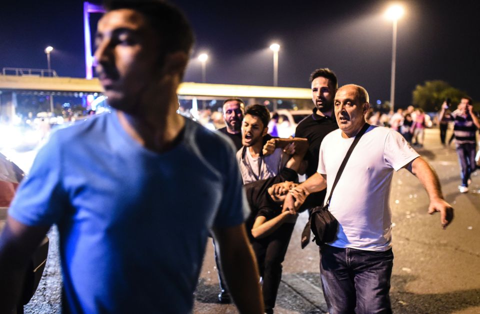 People were forced to carry the wounded after clashes with the army