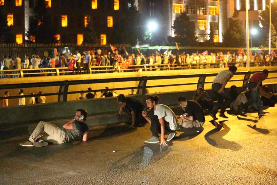 Hundreds duck for cover as protesters clashed with coup plotters