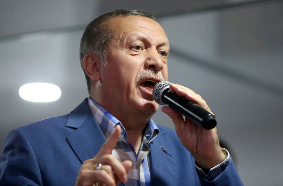 President Erdogan speaks to his supporters in front of his residence after a failed coup attempt in Istanbul