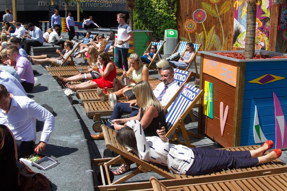 Londoners took advantage of their lunch hour to grab a few rays of sunshine on Monday