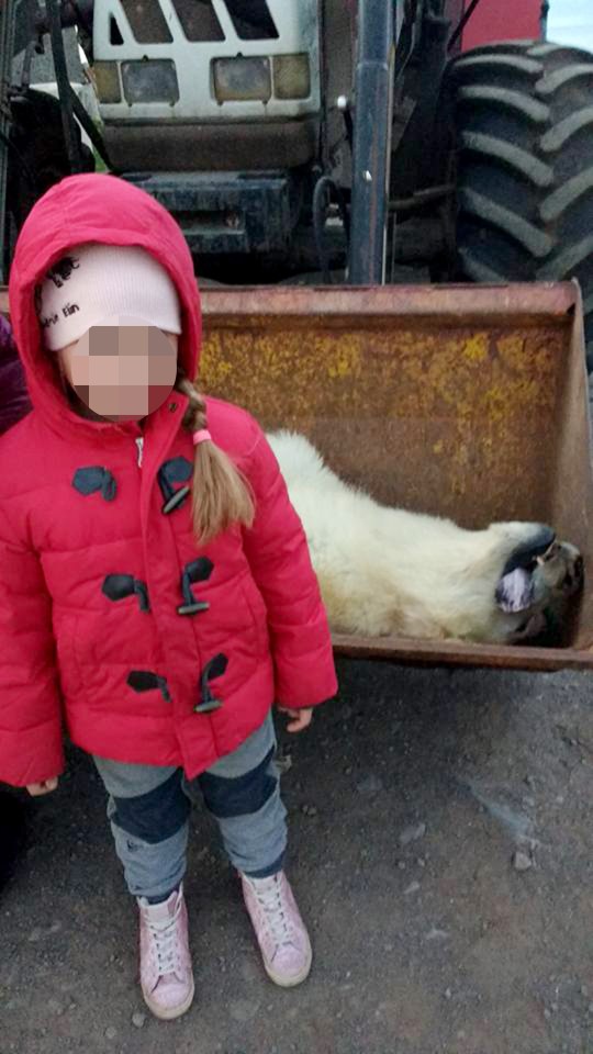  Gudrun, Karitas's daughter poses with the dead beast