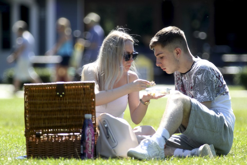 People are enjoying the hot weather in Stratford Upon Avon, Warwickshire, as the temperature climbs today