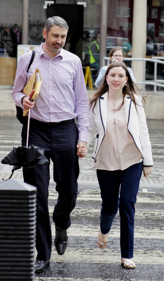 Kirsty Cahill, 33, pictured with her new partner outside court