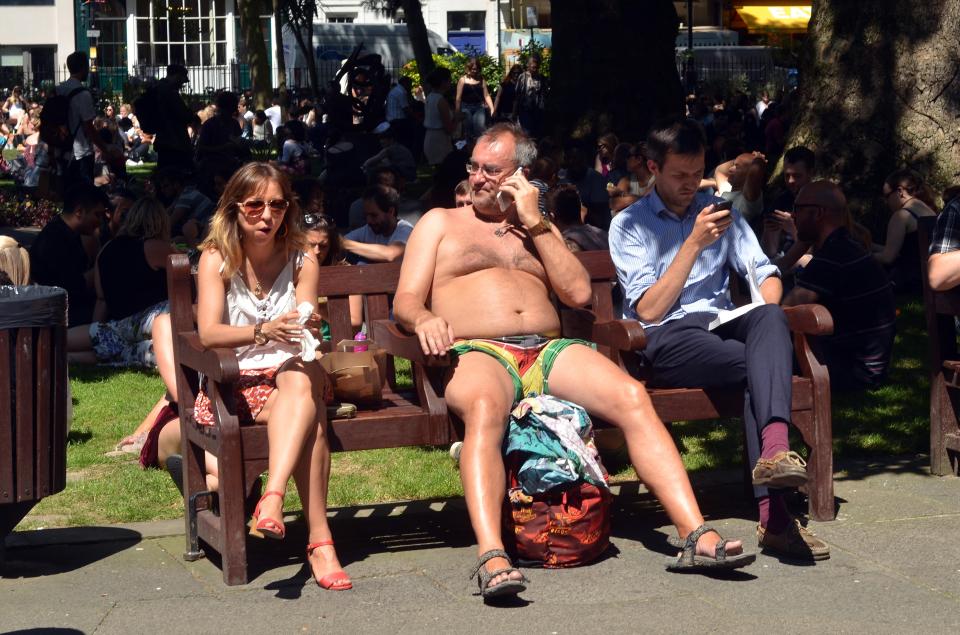Soho Square London UK 19 July 2016 Lunchtime crowd relax and enjoy the sunshine in the heart of Soho on the hottest day of the year as temperatures reach 34 degrees Celsius. ¿ JOHNNY ARMSTEAD/Alamy Live News