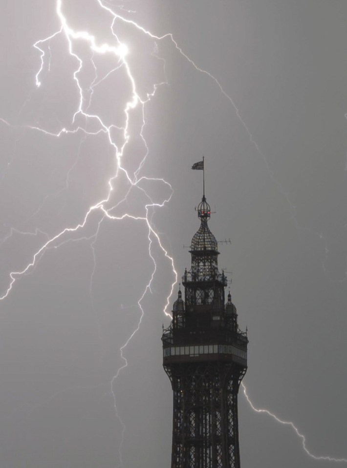 Lightning behind Blackpool Tower on Wednesday morning as thunderstorms hit the region after the hot weather