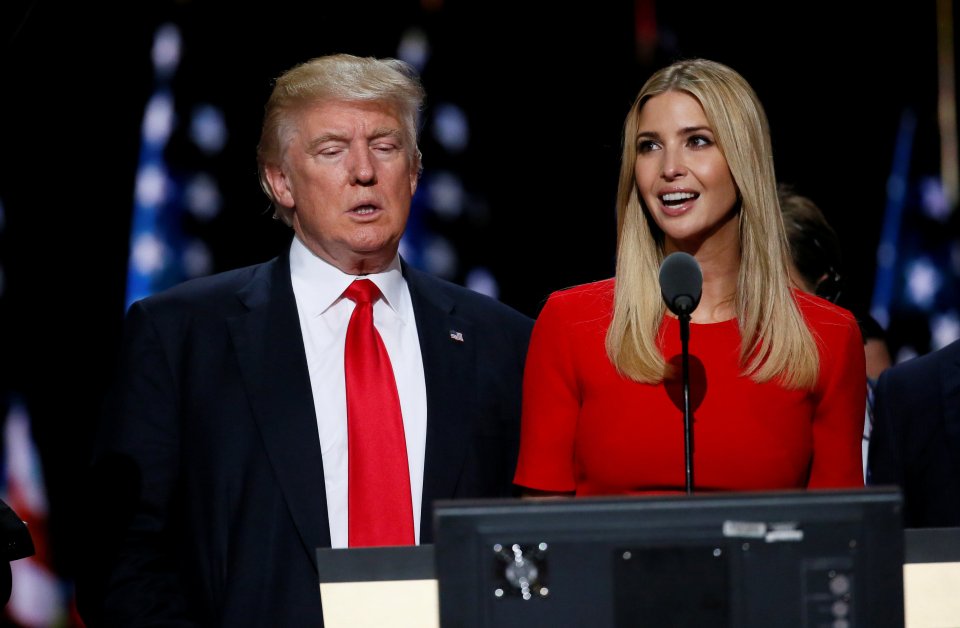 Republican presidential nominee Donald Trump looks at a monitor with daughter Ivanka doing a sound check during Trump's walk through at the Republican National Convention in Cleveland