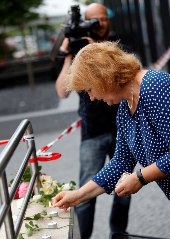 Tributes were being laid at the scene today